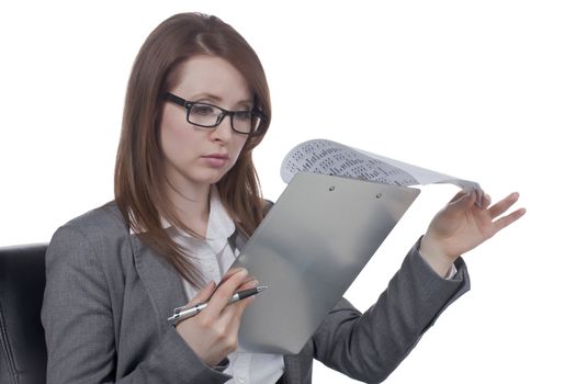 Close-up image businesswoman reading a report against the white surface