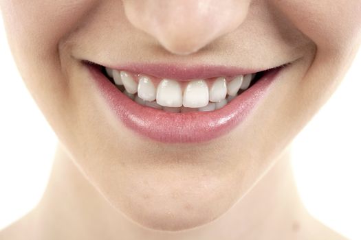 Close up image of female lips with toothy smile