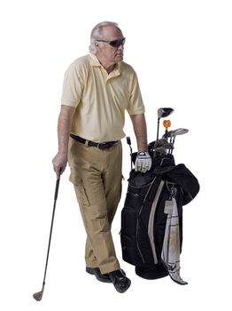 Portrait of an old male golfer with bag beside him isolated on a white surface