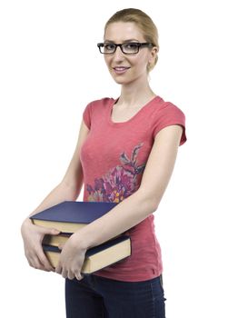 Pretty school girl with eyeglasses holding books