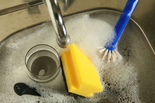 doing the dishes cleaning dirty dishes ...........