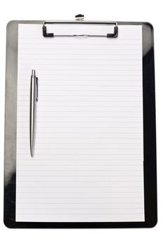 Pen on the left of note pad on a white background