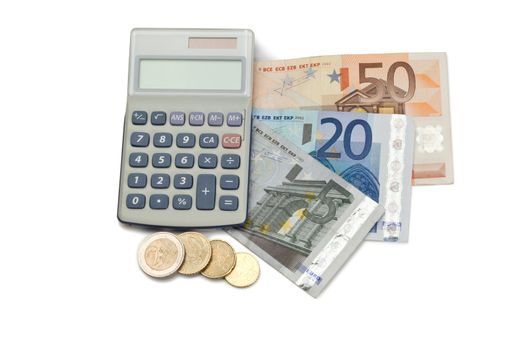 Coins and cash with pocket calculator on a white background