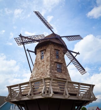 beautiful old windmill landscape with blue sky