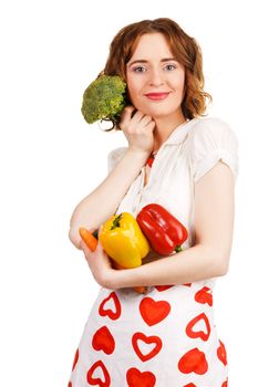 Beautiful housewife with a bunch of fresh vegetables, white backgorund