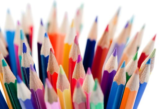 Plenty of color pencils on a white background