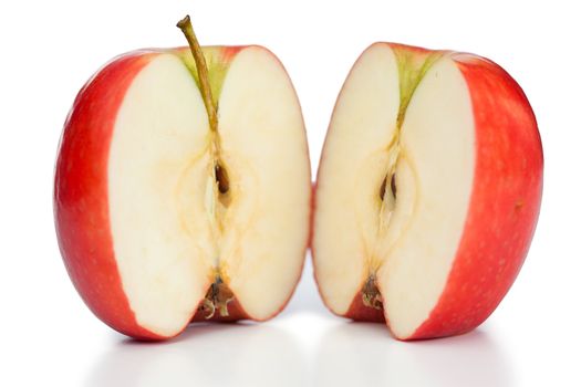 Halved apple on a white background