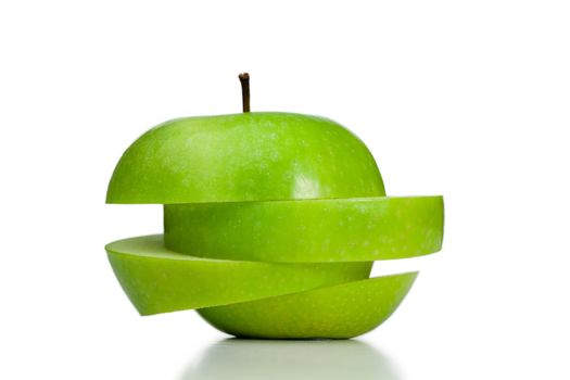 Cut and thrown of center apple on a white background