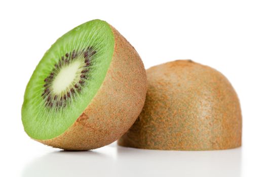 Halved kiwi on a white background