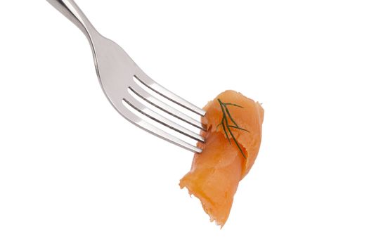 Close-up image of fresh salmon sashimi on a fork with dill leaves