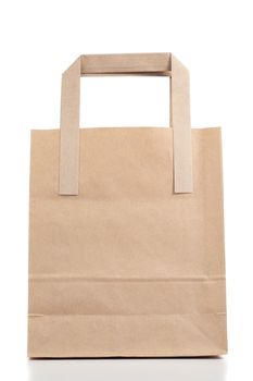 Brown paper bag on a white background