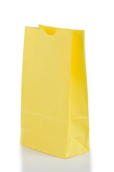 Yellow paper bag on a white background