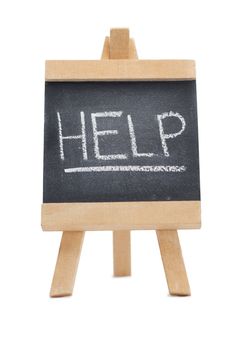 Chalkboard with the word help written on it isolated against a white background