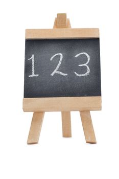 Chalkboard with the figures 123 written on it isolated against a white background