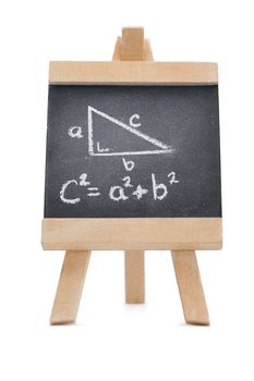 Chalkboard with a mathematical formula and a geomerical figure written on it isolated against a white background