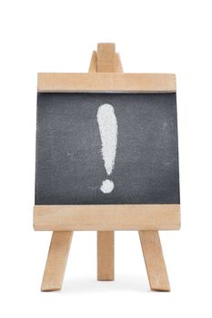 Chalkboard with an exclamation mark written on it isolated against a white background