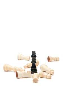 Dark king and white pieces of chess on a white background