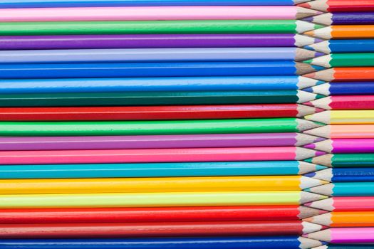 Joined color pencils on their own background
