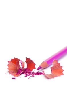 Purple pencil on a white background