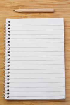 Notebook and pen on a desk
