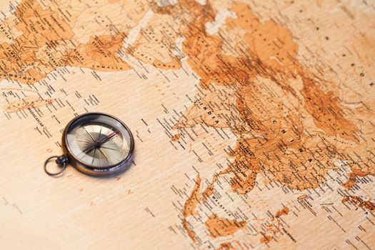 World map with compass showing Africa and Asia