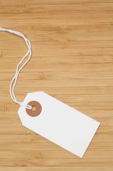 White tag isolated on a desk