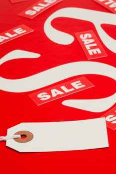 White tag on a red and white background