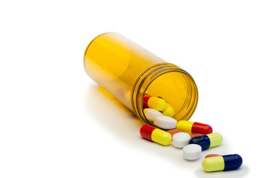 Spread pills on a white background