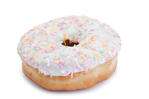 Pink Iced Doughnut covered in sprinkles isolated against white background