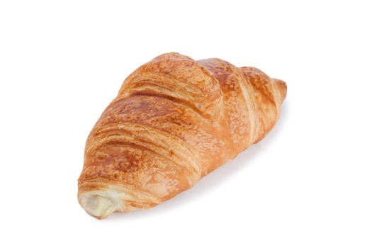 Golden croissant isolated on a white background 