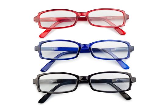 Black red and blue glasses on a white background