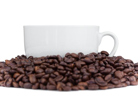 Cup of coffee surrounded with coffee beans on a white background