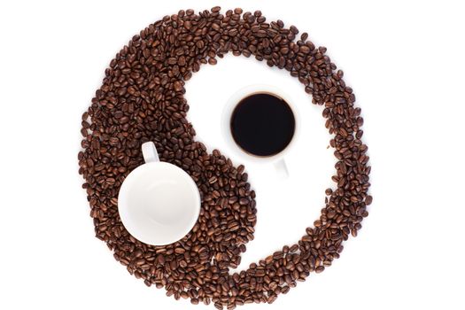 Brown and white symbol made of coffee beans on a white background
