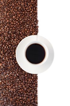 Cup of coffee on a white and made of beans background