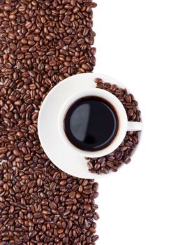 Cup of coffee and beans on white and made of beans background