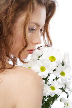 Face portrait of a beautiful model with flowers