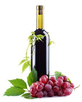 Bottle of red wine with grapes, white background