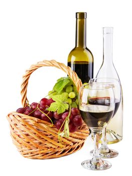 Bottles of red and white wine with grapes, white background