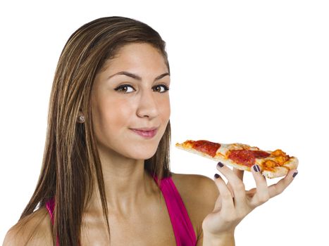 Portrait of a pretty teenage girl holding a slice of pizza.