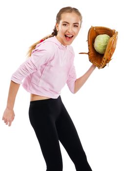 Young woman holding a cabbage in baseball glove