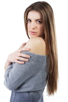 Portrait of an elegant serene woman in woollen sweater