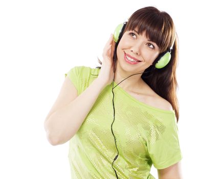 Beautiful girl with green headphones, white background