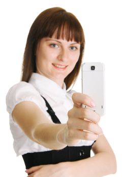 Young woman photographing with a mobile phone