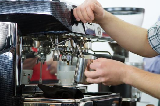 Professional coffee machine closeup with selective focus