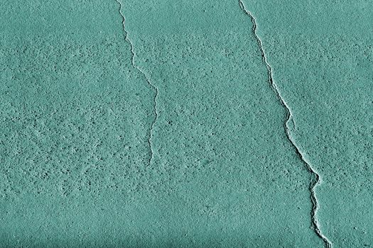 Abstract turquoise tinted texture with fissures