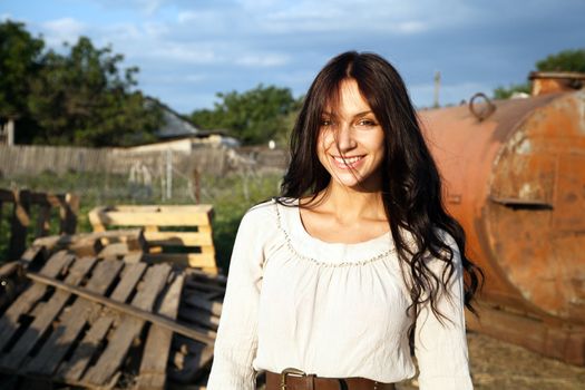 Gorgeous fashionable woman in countryside