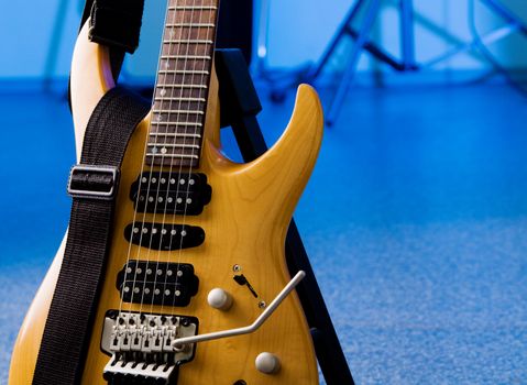 Electric guitar closeup isolated on white background