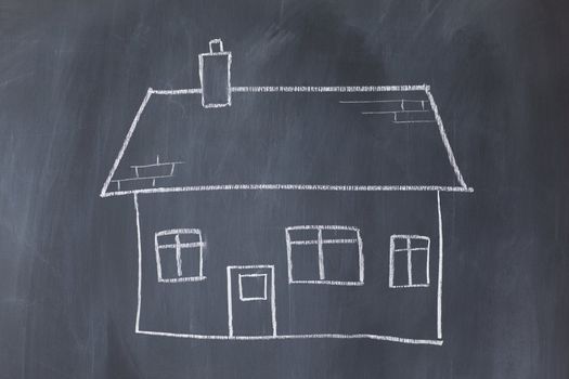 Big house on a blackboard