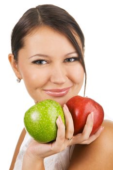 Young beautiful woman holding two juicy  apples