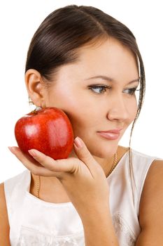 Young beautiful woman holding two juicy  apples